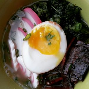 Photo of finished bowl of bacon ramen that has been artfully arranged