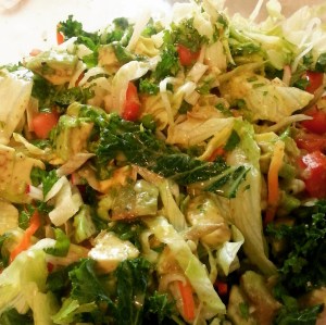 Picture of Simple Avocado Salad all mixed together and glistening in a delicious Lemon Cilantro Salad Dressing